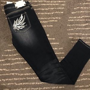 Vanity jeans tags still attached